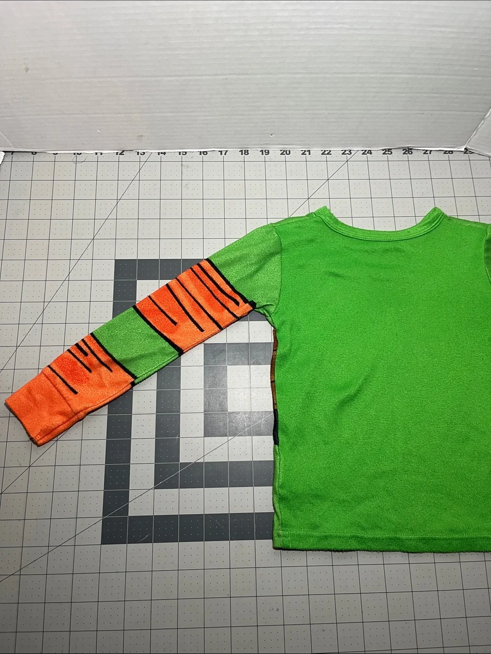 Kids Green Turtle Shell Pajama Top with Orange Sleeve Accents